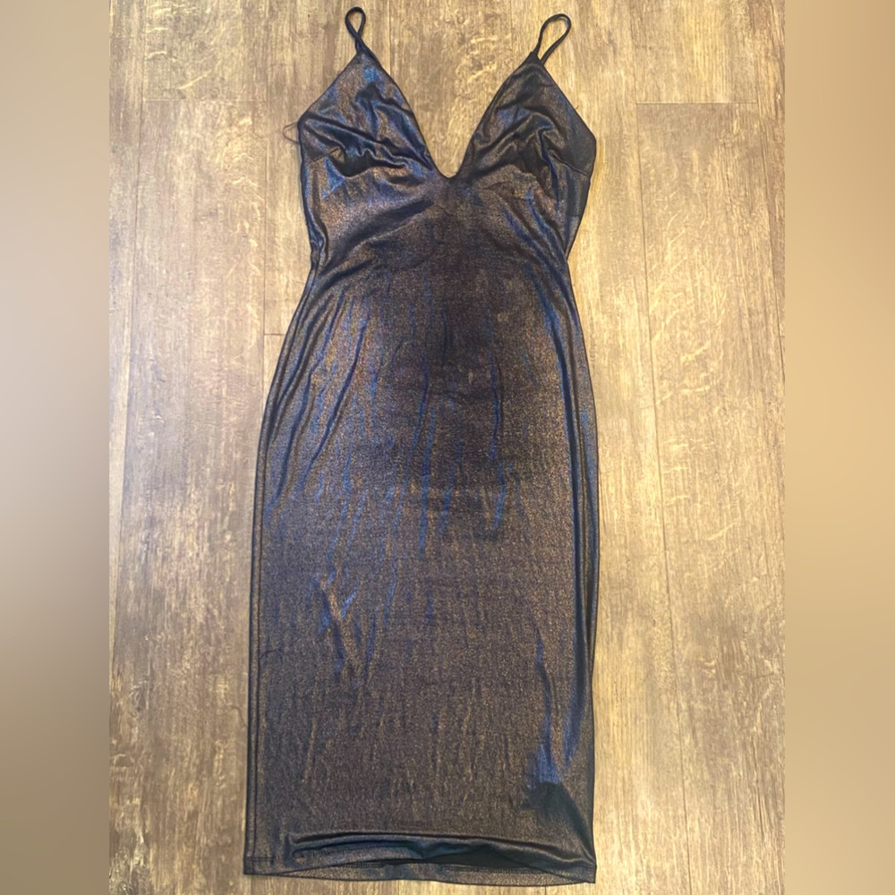 Metallic gray spaghetti strap dress in size M. Dress has good stretch.